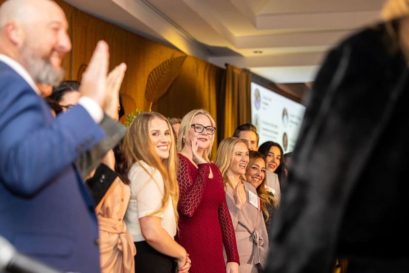 SITE SoCal 2026 board of directors members standing and smiling at the Installation Dinner, with hands raised as they give their oath of office.