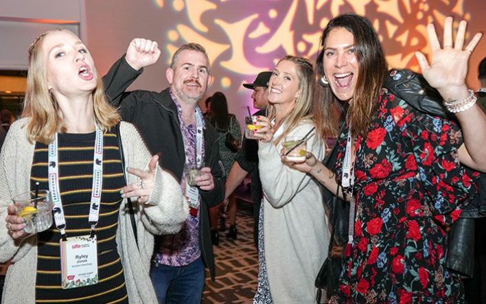 group of happy people at a party