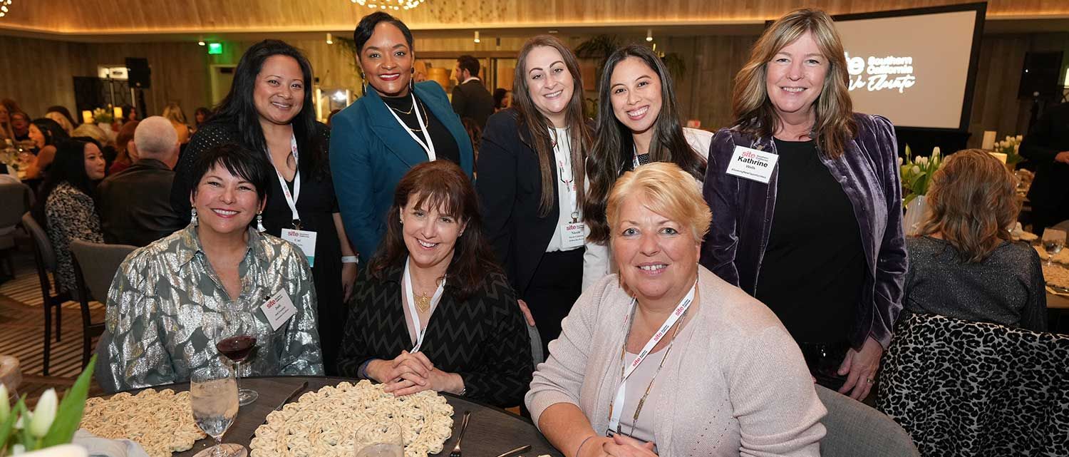 a group of happy SITE SoCal members with drinks at the Holiday Event & Charity Gala.